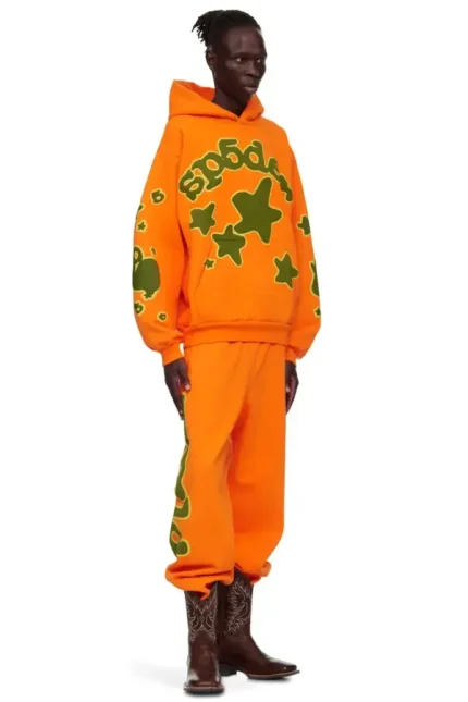 Sp5der Beluga Orange Tracksuit Pose