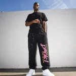 Sp5der PINK Sweatpants Black Pose in
