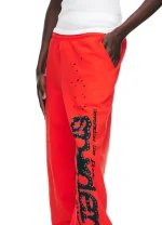 Sp5der PINK V2 Sweatpant Red Left Pose