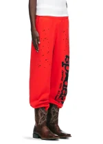 Sp5der PINK V2 Sweatpant Red Pose in