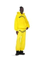 Sp5der LEGACY Tracksuit Yellow Pose