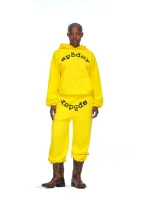 Sp5der LEGACY Tracksuit Yellow Pose in